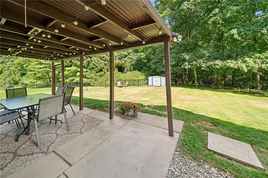 401 Finley Road Pittsburgh, PA 15239 - Photo 30 of 35 a view of a swimming pool with a patio