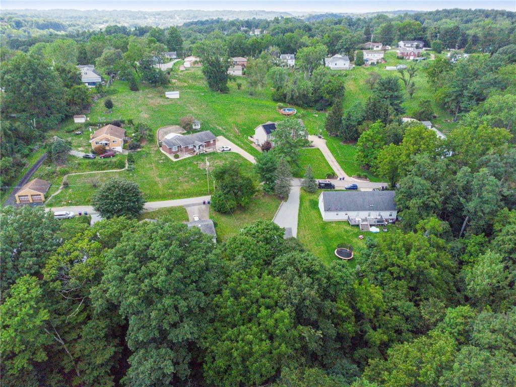 401 Finley Road Pittsburgh, PA 15239 - Photo 33 of 35 an aerial view of residential houses with outdoor space and trees all around