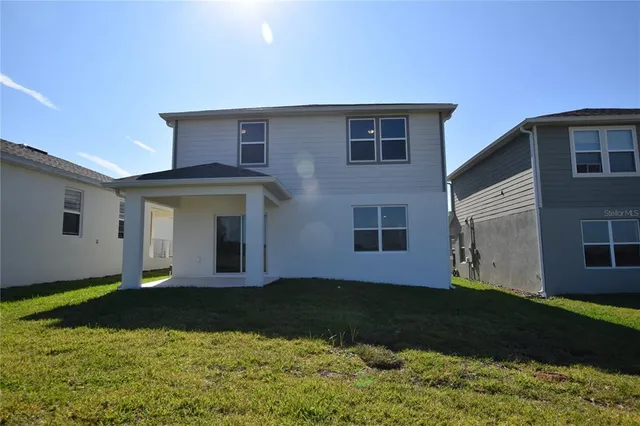 a house view with a garden space