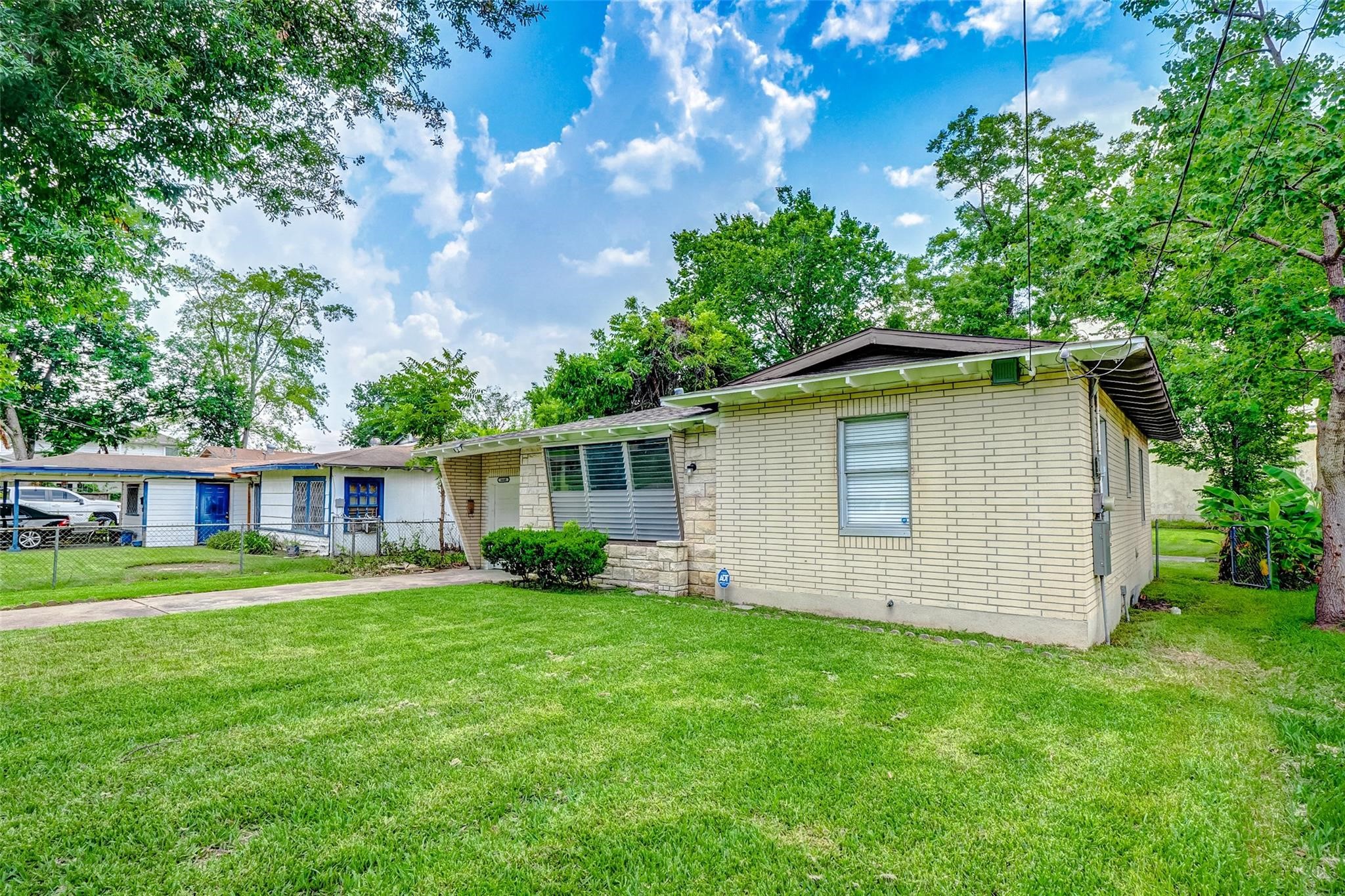 4440 Castor Street Houston, TX 77022 - Photo 29 of 30 a view of backyard of house with green space