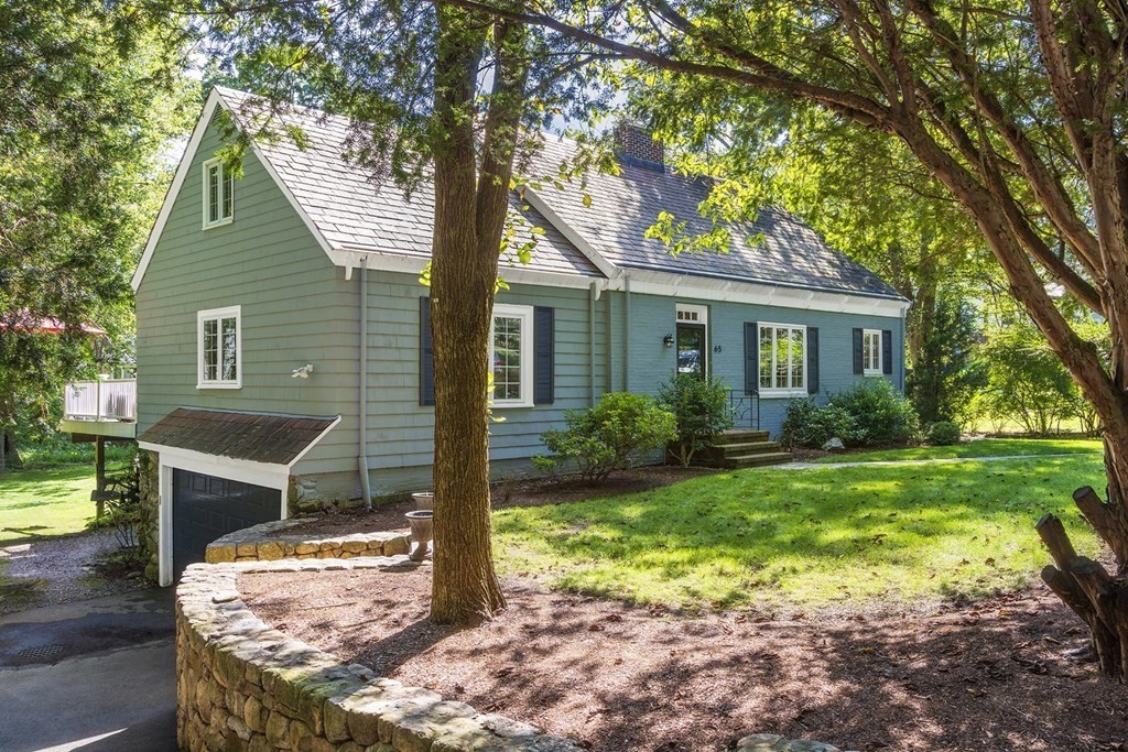 a house view with a garden space