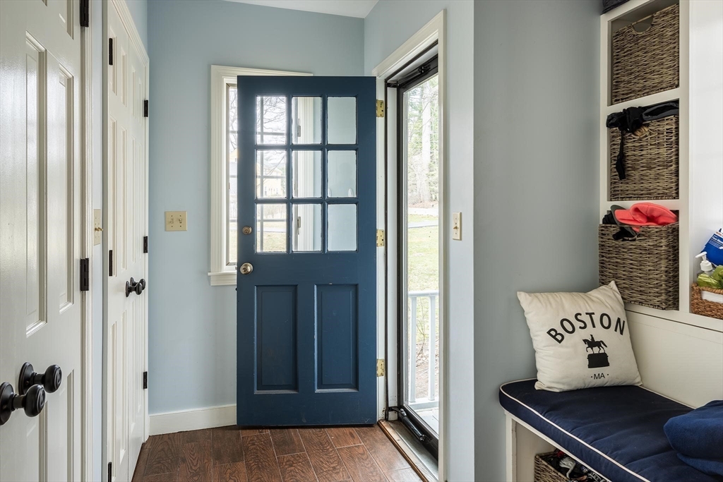65 Rokeby Road Newton, MA 02468 - Photo 7 of 13 a living room with furniture and a window
