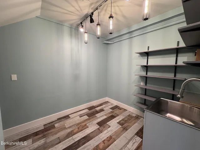 a view of a room with rack on the wall