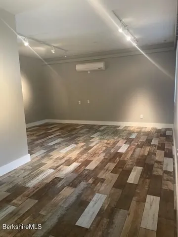 a view of a bathroom with a toilet