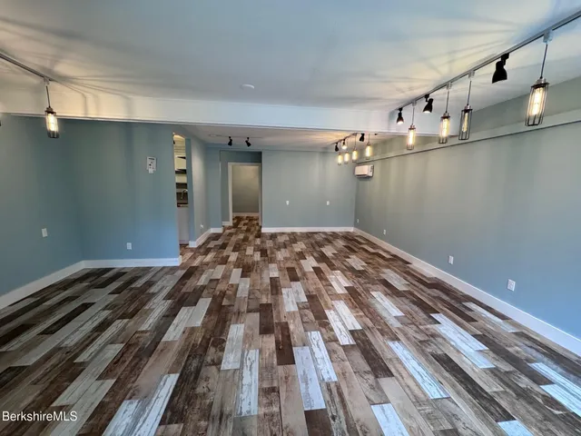 a view of a livingroom with a hallway