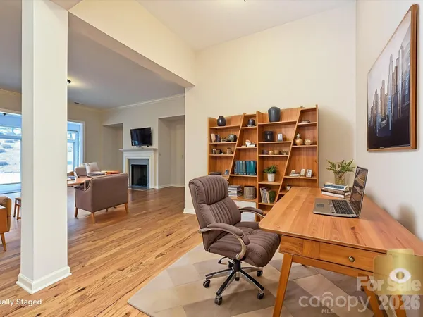 a view of a workspace with furniture
