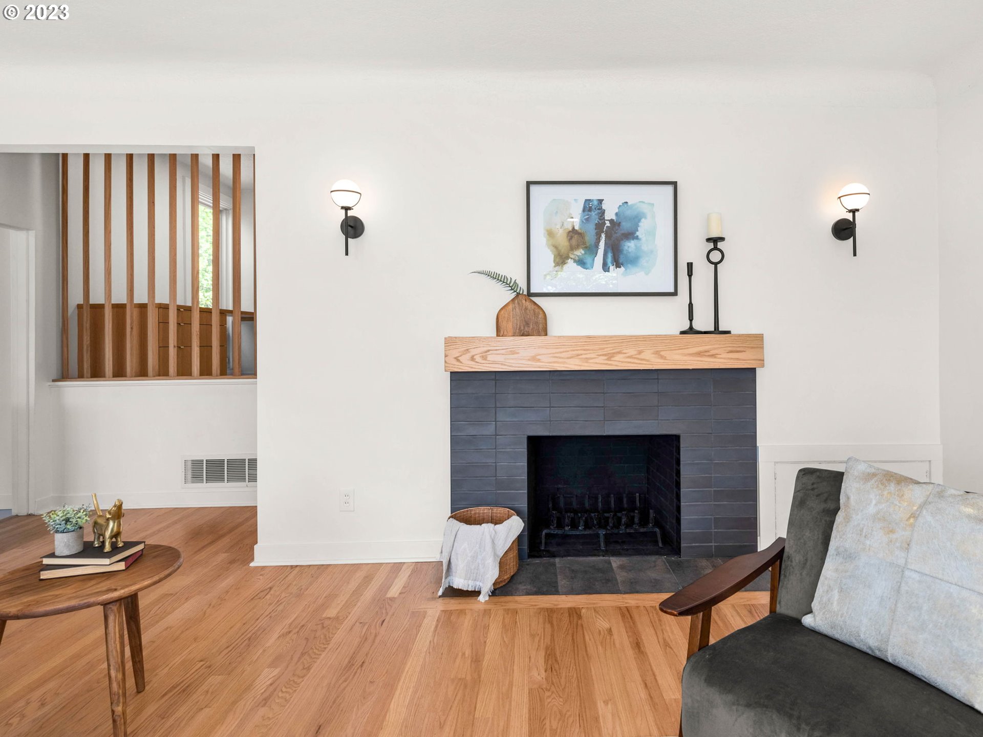 3590 Southwest Patton Road Portland, OR 97221 - Photo 16 of 32 a living room with furniture and a fireplace