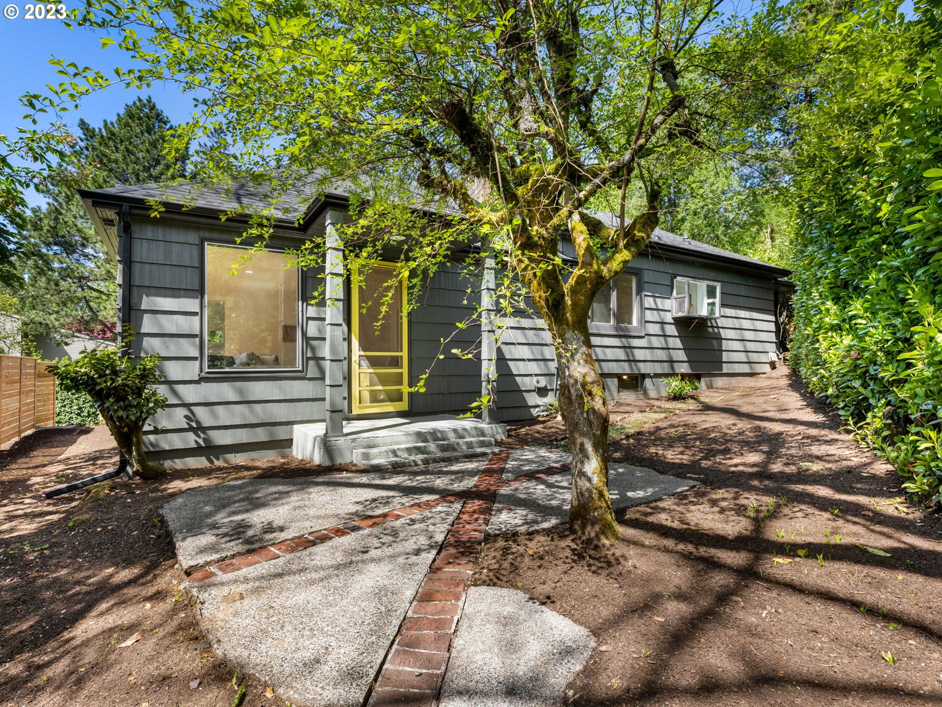 3590 Southwest Patton Road Portland, OR 97221 - Photo 2 of 32 a front view of a house with garden