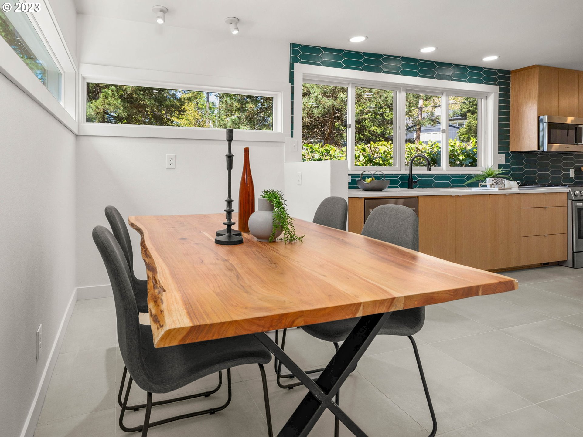 3590 Southwest Patton Road Portland, OR 97221 - Photo 10 of 32 a view of a dining room with furniture window and outside view