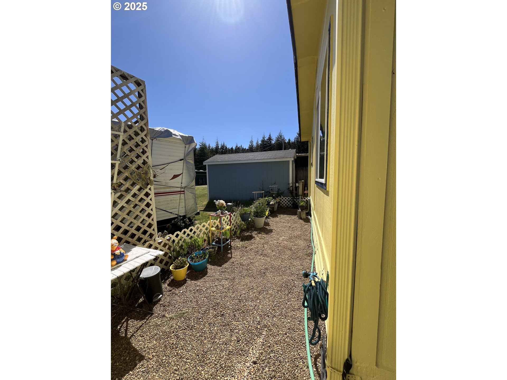 83763 Highway 101, Unit 10 Florence, OR 97439 - Photo 34 of 34 a bathroom with a sink and a mirror