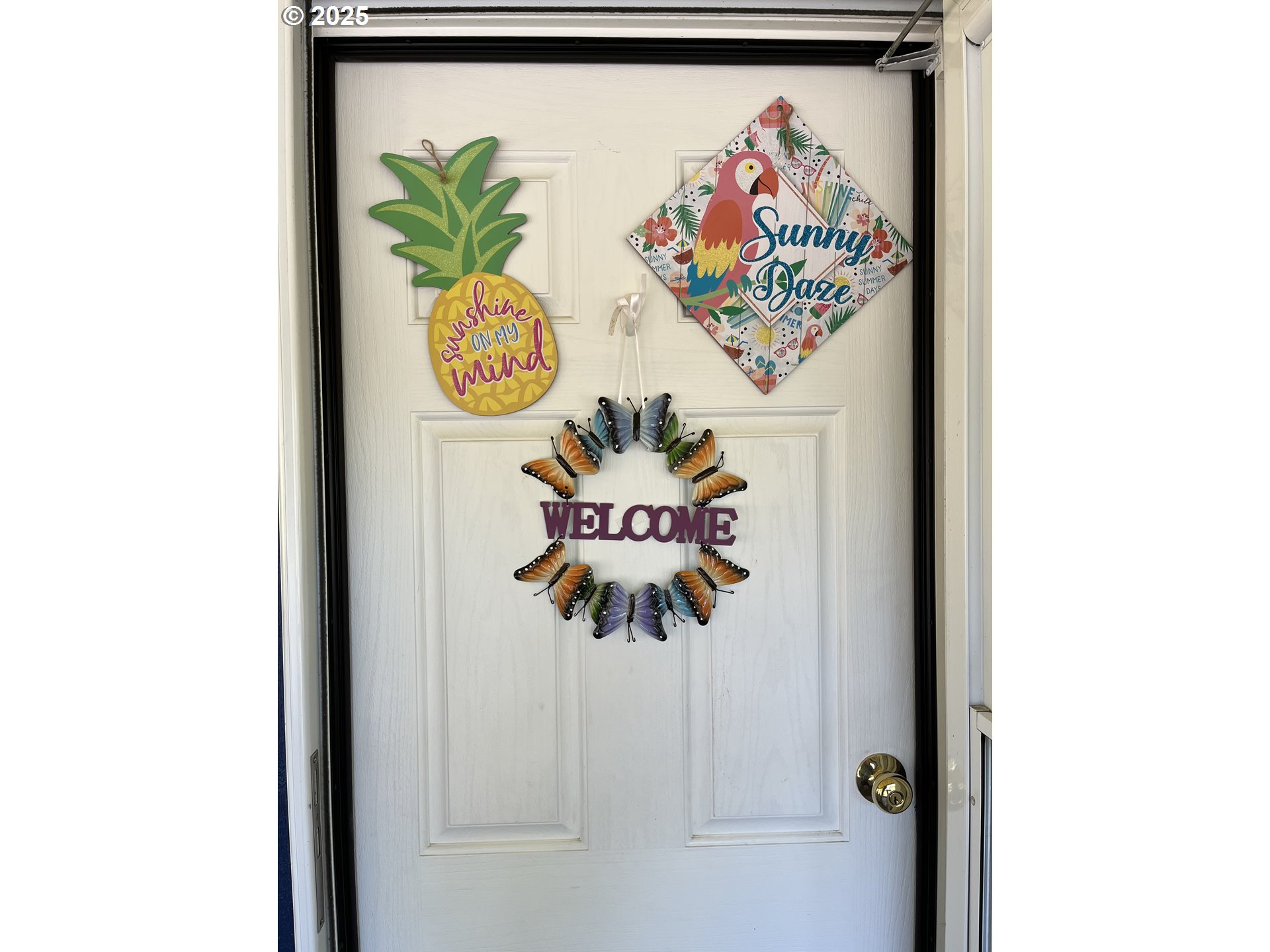 83763 Highway 101, Unit 10 Florence, OR 97439 - Photo 10 of 34 a view of a hallway with painting on the wall