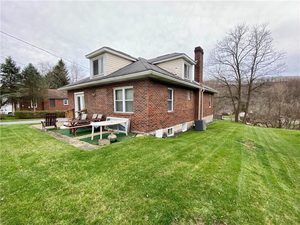 73 Noblestown Road Carnegie, PA 15106 - Photo 24 of 25 a view of a house with a yard and sitting area