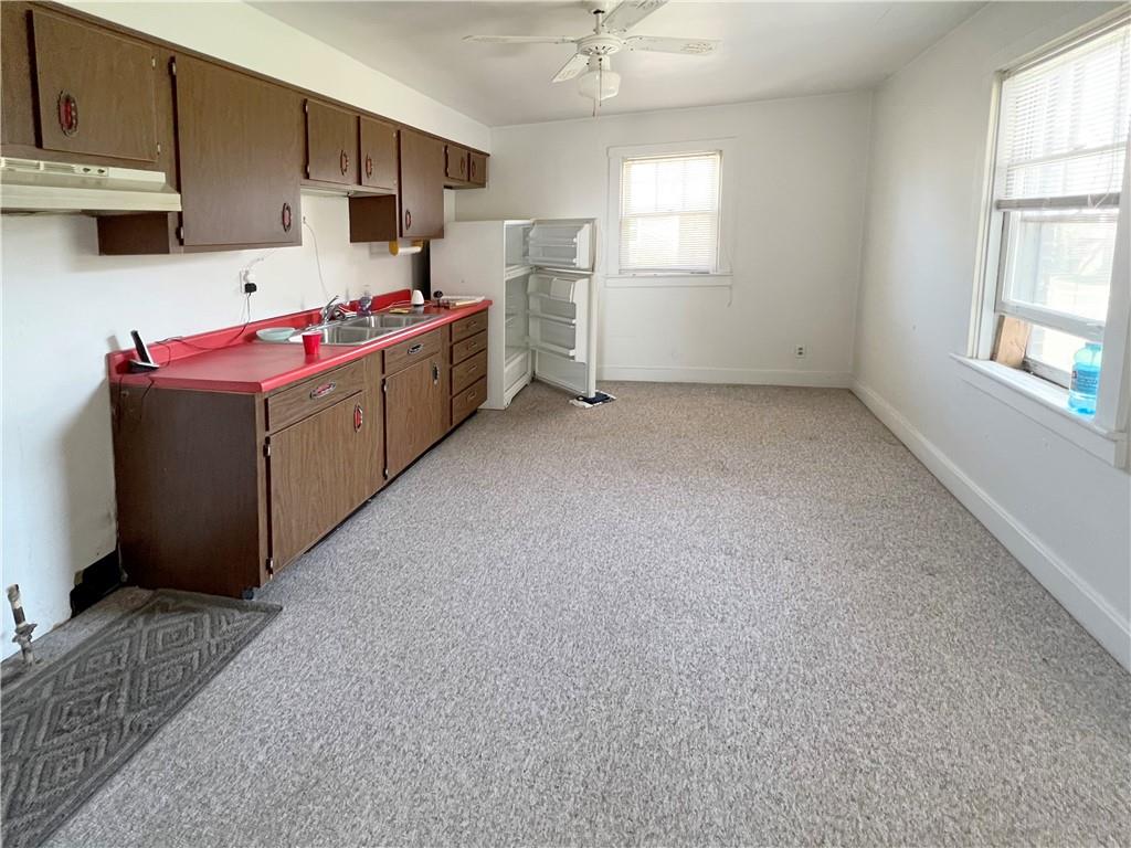 73 Noblestown Road Carnegie, PA 15106 - Photo 9 of 25 a kitchen with cabinets and window