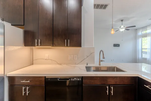 a bathroom with a sink toilet tub and shower