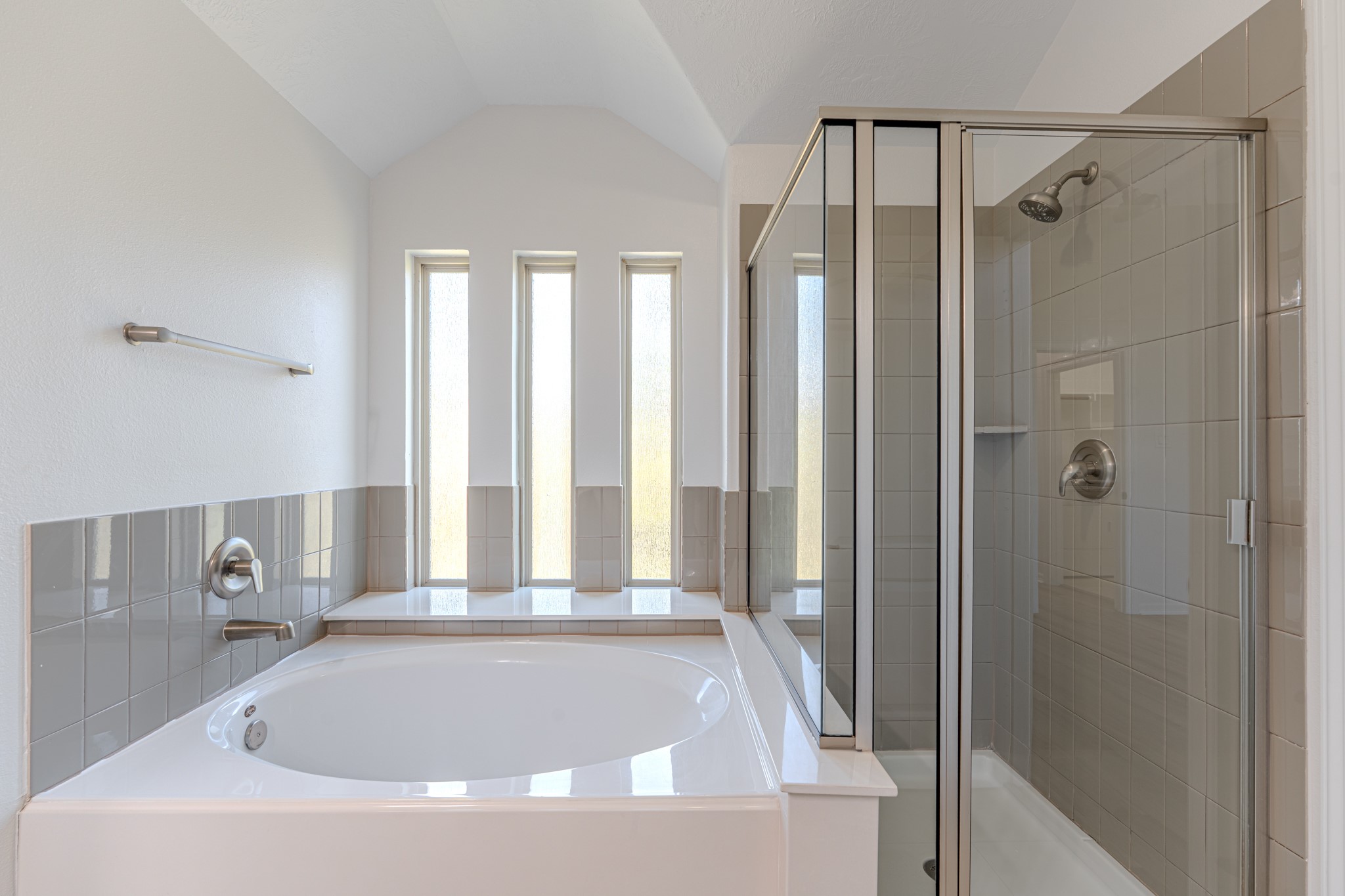 58 Aventura Place Spring, TX 77389 - Photo 37 of 50 a bathroom with a bathtub and shower