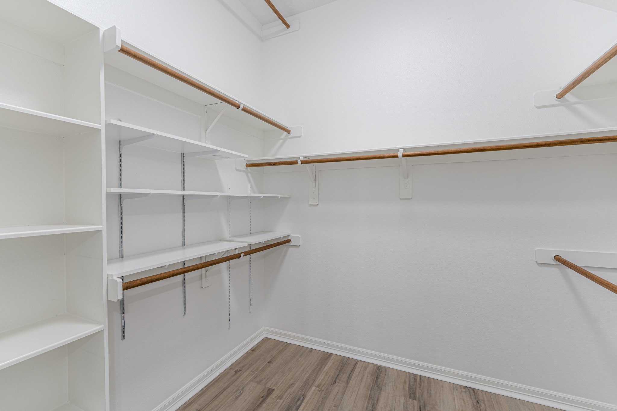 58 Aventura Place Spring, TX 77389 - Photo 38 of 50 a view of an empty walk in closet