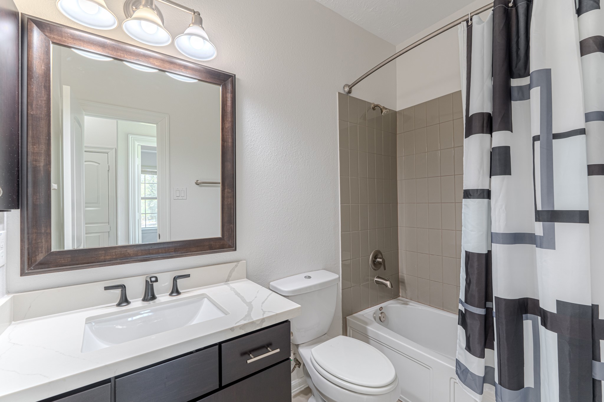 58 Aventura Place Spring, TX 77389 - Photo 43 of 50 a bathroom with a sink toilet tub and shower