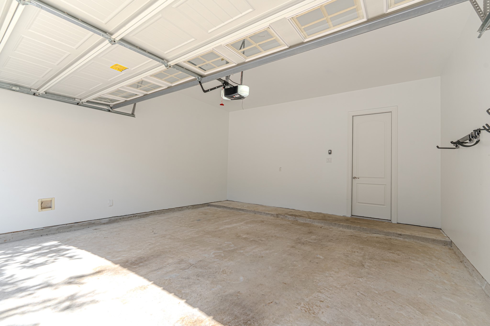 58 Aventura Place Spring, TX 77389 - Photo 49 of 50 a view of a room with racks on the wall