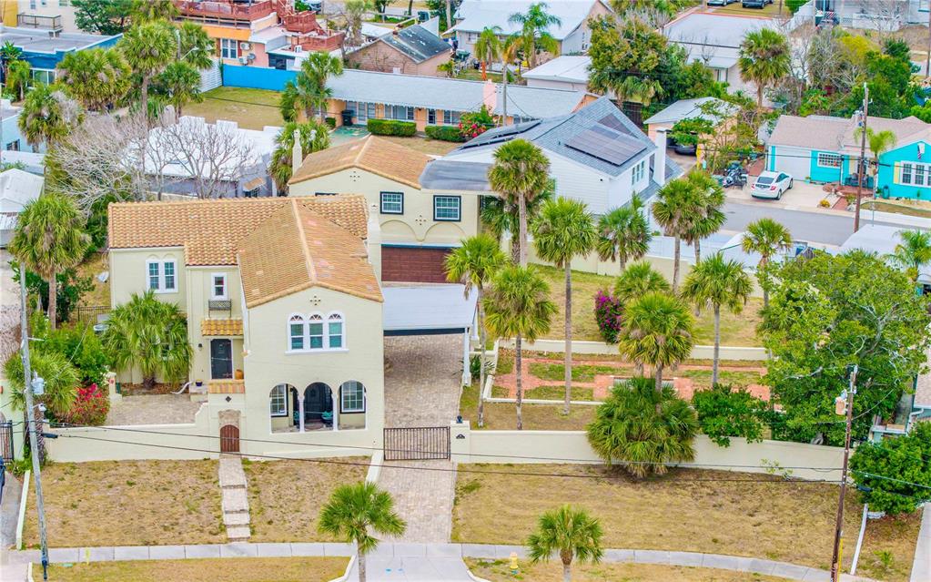 319 Wisteria Road Daytona Beach, FL 32118 - Photo 1 of 1 an aerial view of multiple houses with a yard