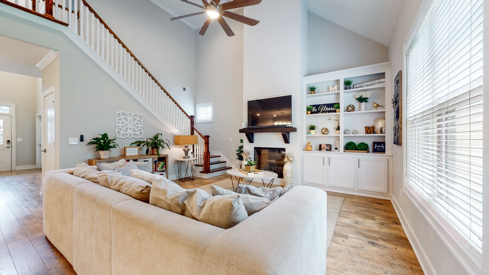 3413 Pershing Drive Murfreesboro, TN 37129 - Photo 17 of 43 a living room with furniture a flat screen tv and a window