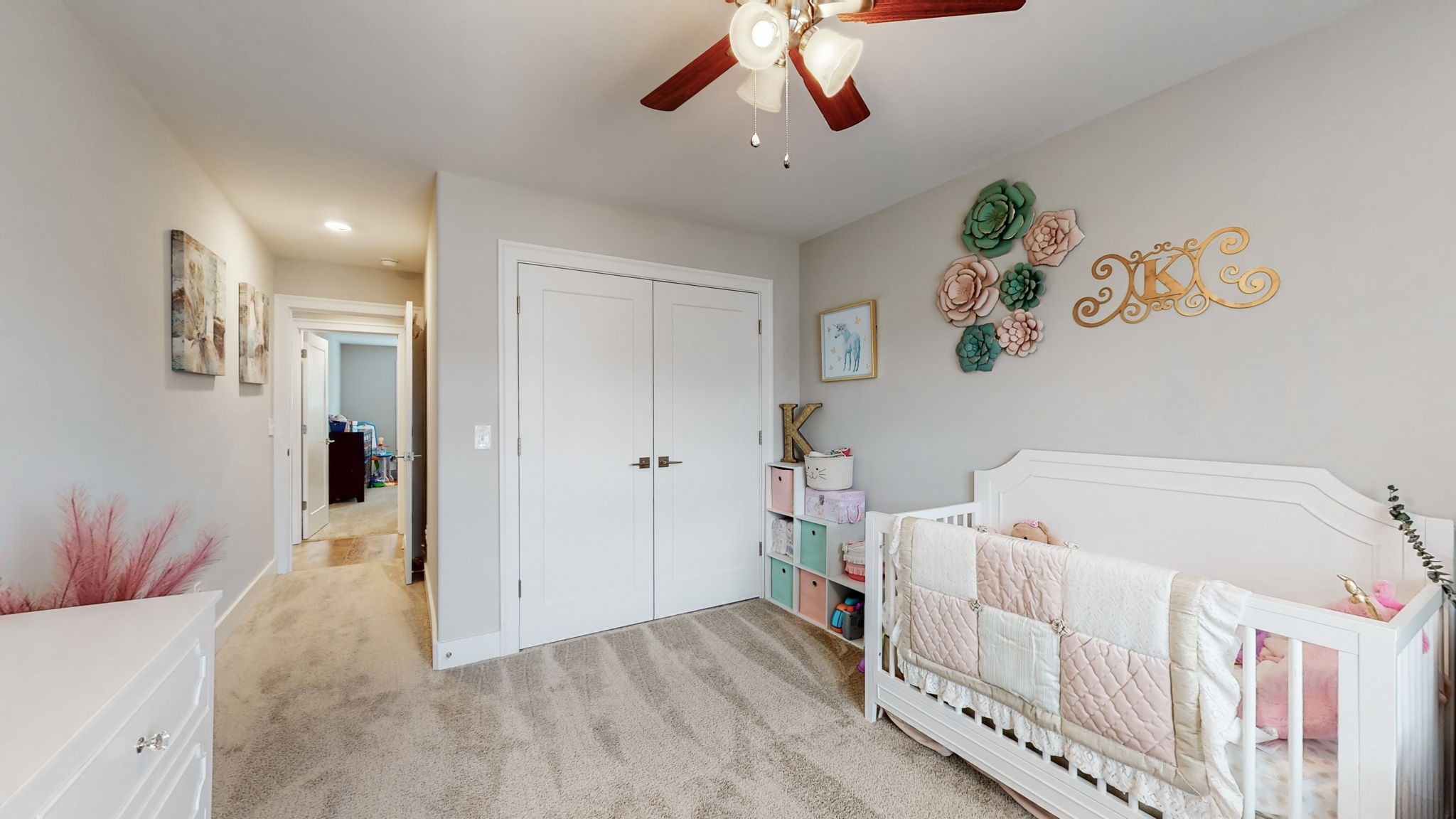 3413 Pershing Drive Murfreesboro, TN 37129 - Photo 33 of 43 a bedroom with a bed and a chandelier