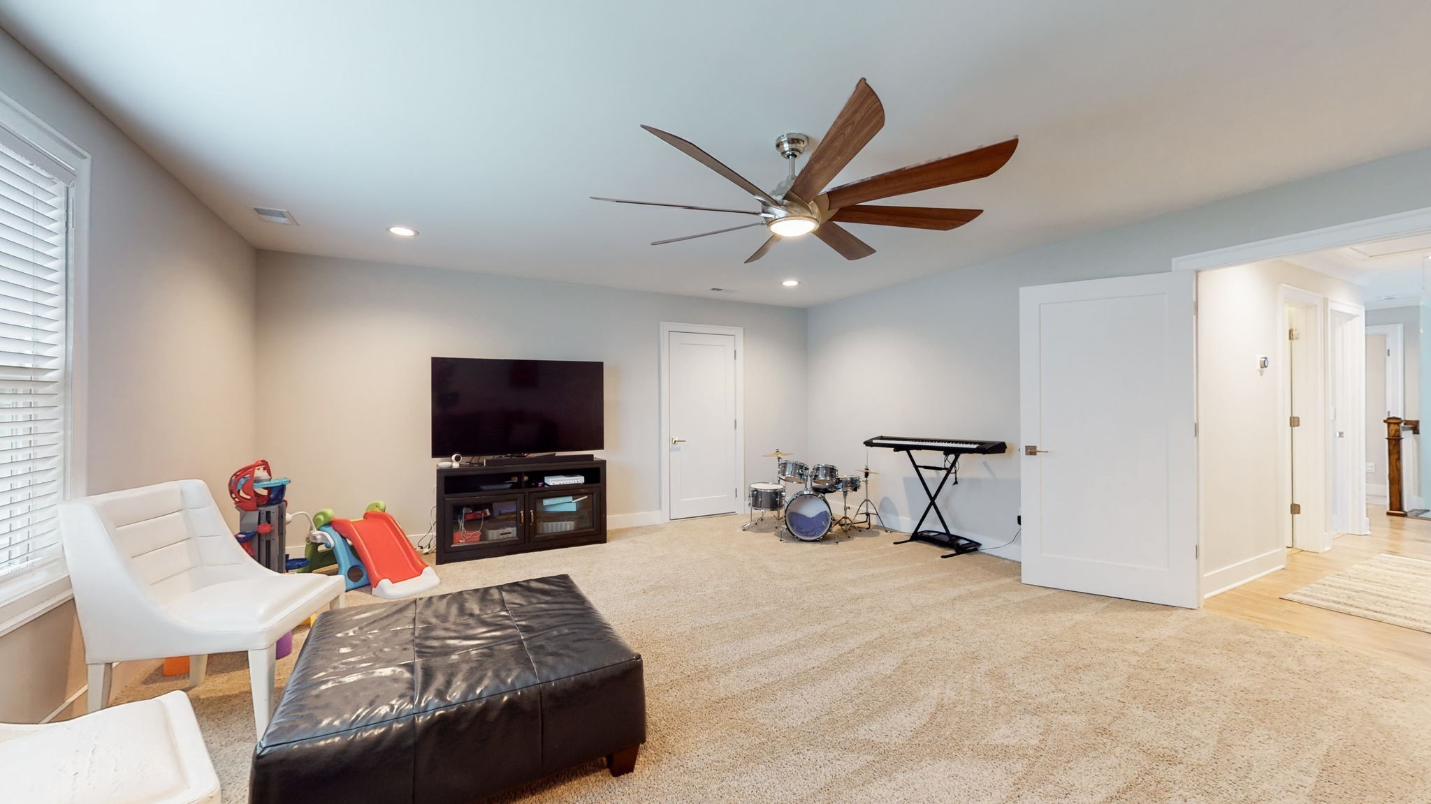 3413 Pershing Drive Murfreesboro, TN 37129 - Photo 36 of 43 a bedroom with a bed and a flat screen tv