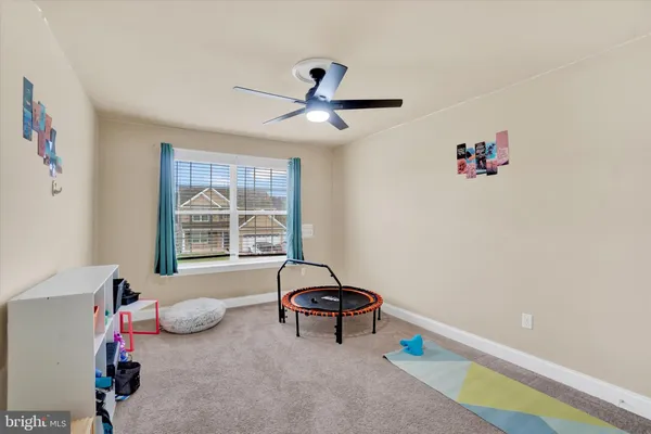 a room with furniture and window