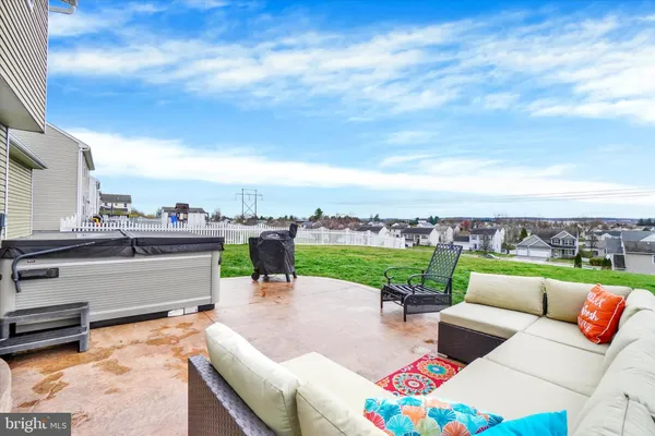 a view of a terrace with couches and a table