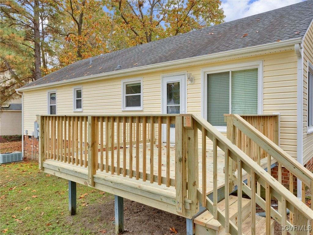 3304 Rufford Place Chester, VA 23831 - Photo 3 of 26 a porch with a bench next to a yard