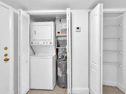 a storage room with a washer and dryer