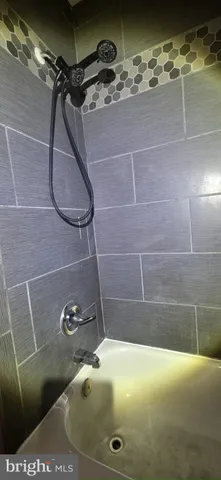 a bathroom with a tub