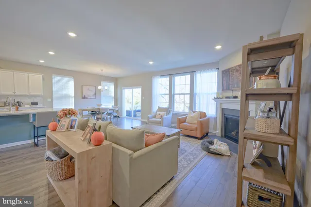 a room with furniture and a flat screen tv