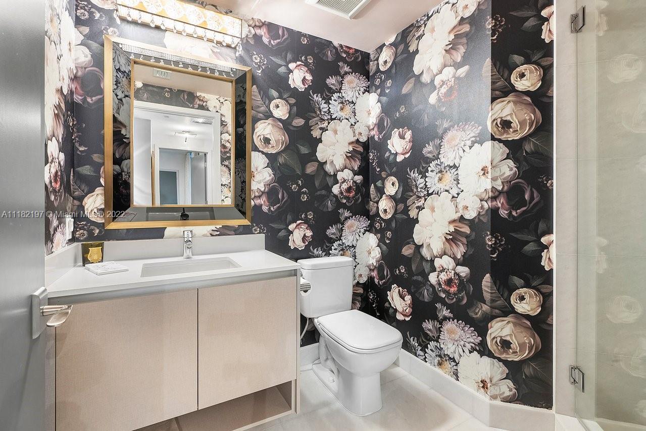 2101 South Surf Road, Unit 2C Hollywood, FL 33019 - Photo 14 of 38 a bathroom with a sink and a toilet