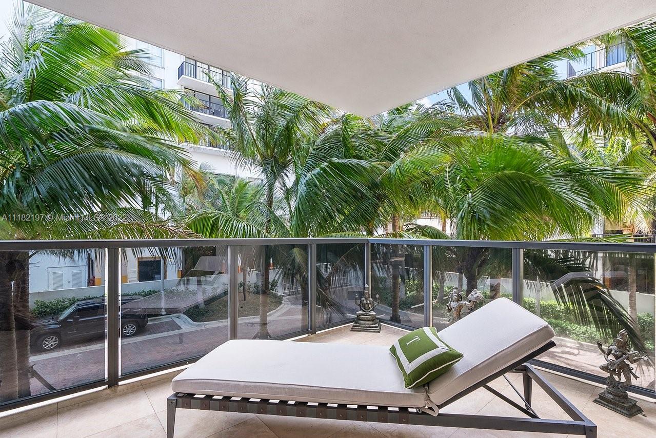 2101 South Surf Road, Unit 2C Hollywood, FL 33019 - Photo 25 of 38 a view of a chairs and table in patio