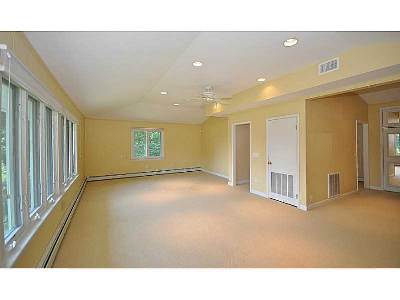 385 Ocean Road Narragansett, RI 02882 - Photo 17 of 25 Bedroom. This second level Guest Suite with ocean views offers kitchen, living area, bedroom & bath. It is perfect for visiting family or friends or even as an in-law apartment.