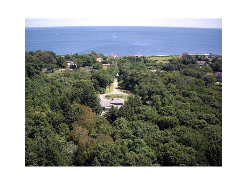 385 Ocean Road Narragansett, RI 02882 - Photo 3 of 25 Aerial View. Whispering Pines sits at the end of a private lane off Ocean Road in the estate area of Narragansett. Its close proximity to the ocean offers views from many of the rooms in the home.
