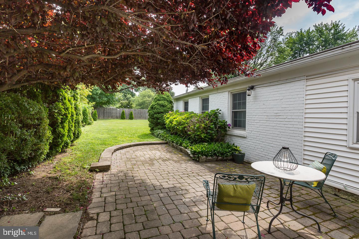 339 East Spring Avenue Ardmore, PA 19003 - Photo 19 of 44 a view of a patio with table and chairs and potted plants