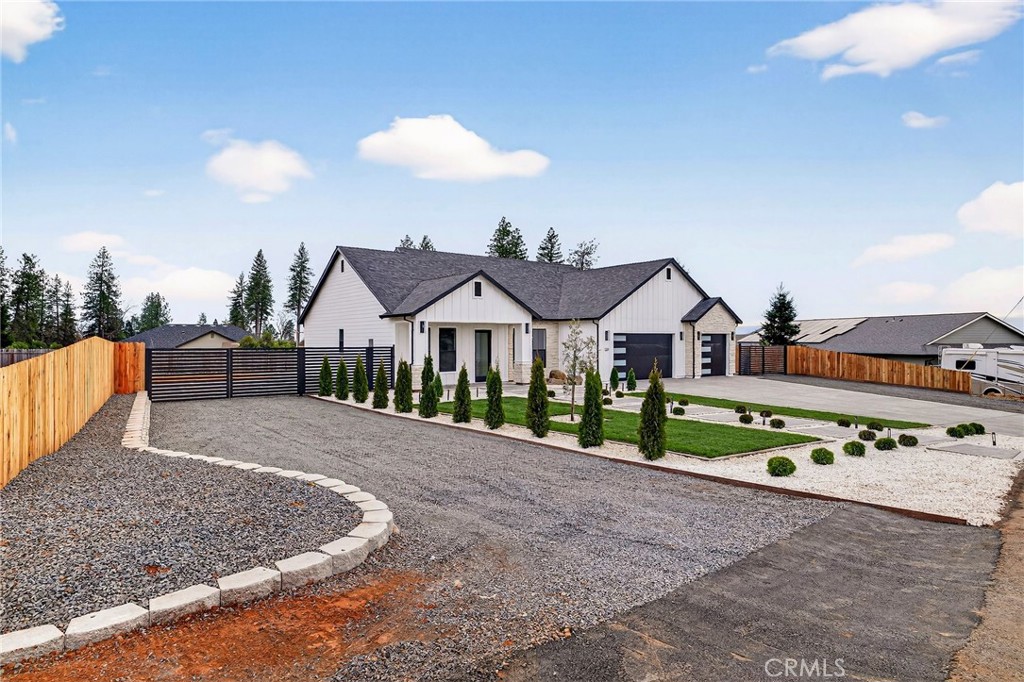 2210 Thornburg Road Paradise, CA 95969 - Photo 11 of 75 a front view of a house with a yard