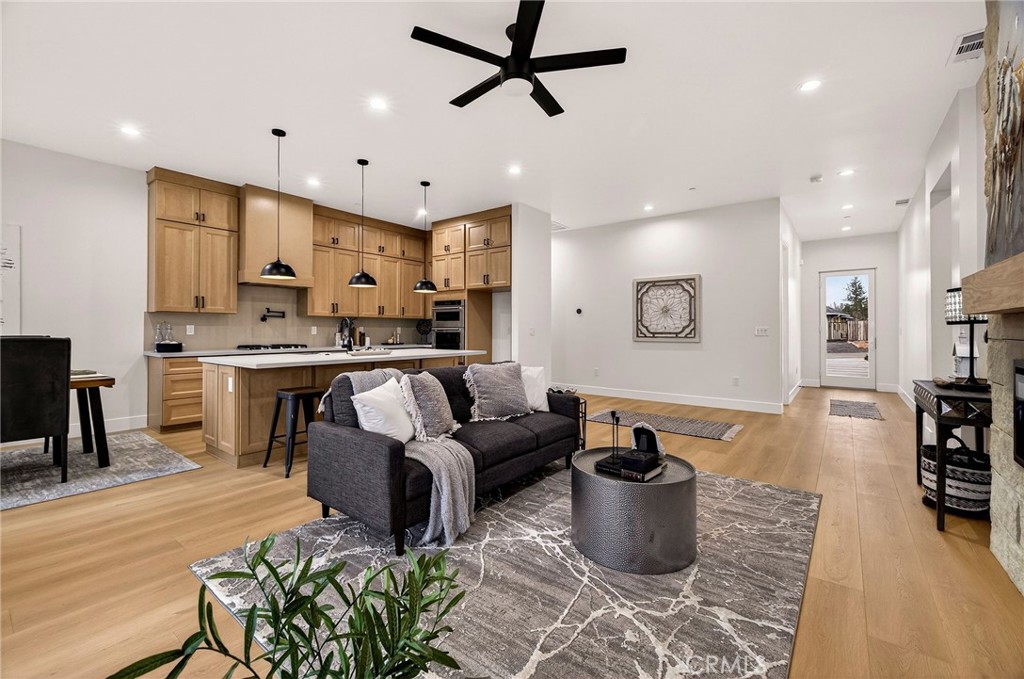 2210 Thornburg Road Paradise, CA 95969 - Photo 20 of 75 a living room with furniture and a wooden floor