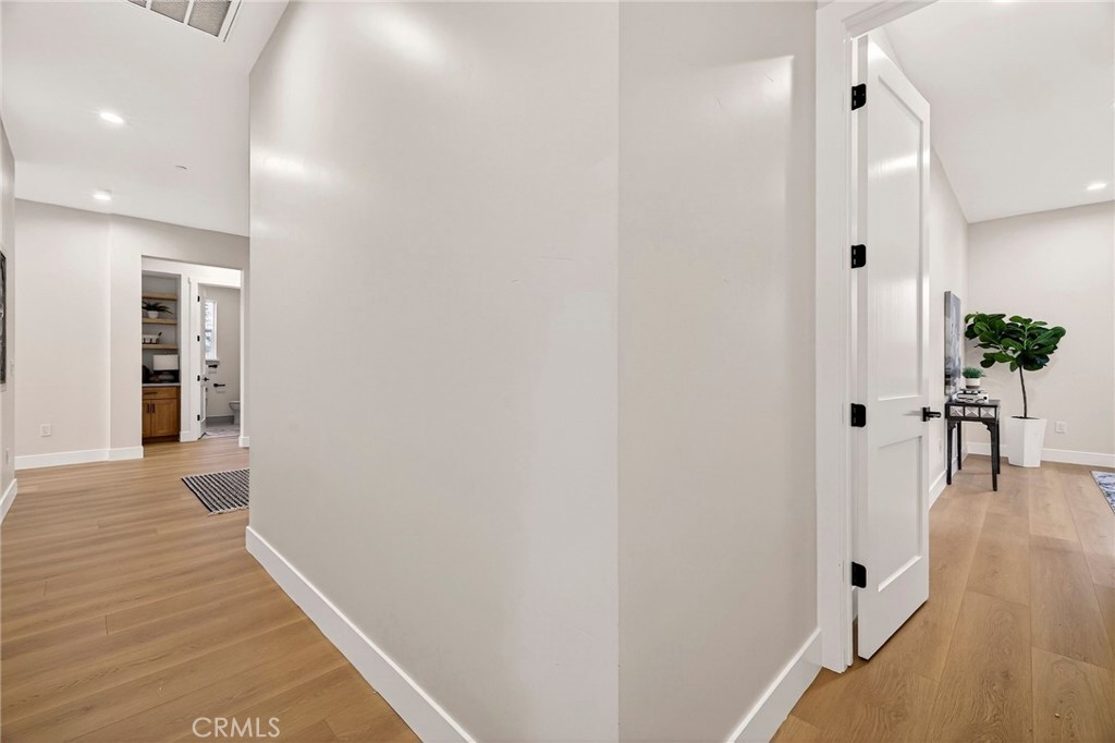 2210 Thornburg Road Paradise, CA 95969 - Photo 27 of 75 a view of a hallway with wooden floor and dining room