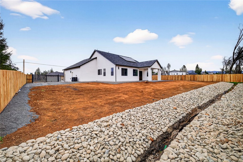 2210 Thornburg Road Paradise, CA 95969 - Photo 55 of 75 a view of an house with outdoor space and sitting area