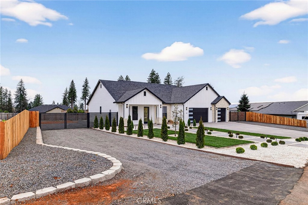 2210 Thornburg Road Paradise, CA 95969 - Photo 8 of 75 a view of a house with a yard and a garden