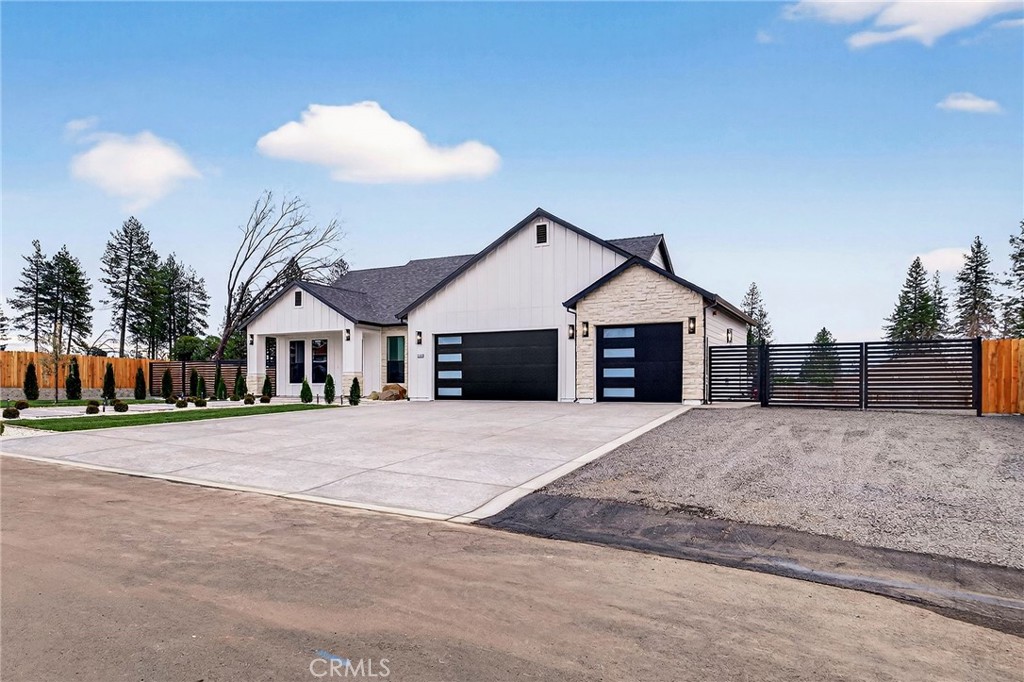 2210 Thornburg Road Paradise, CA 95969 - Photo 10 of 75 a front view of a house with a yard and garage