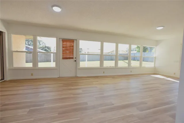 a view of a room with a large window