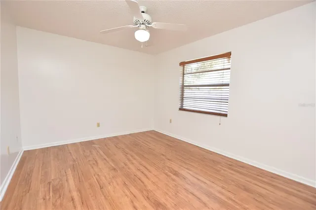 a bathroom with a sink toilet and a mirror
