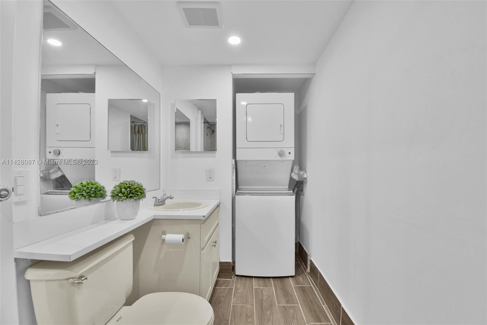 11800 Southwest 18th Street, Unit 5084 Miami, FL 33175 - Photo 28 of 44 a bathroom with a sink toilet and shower