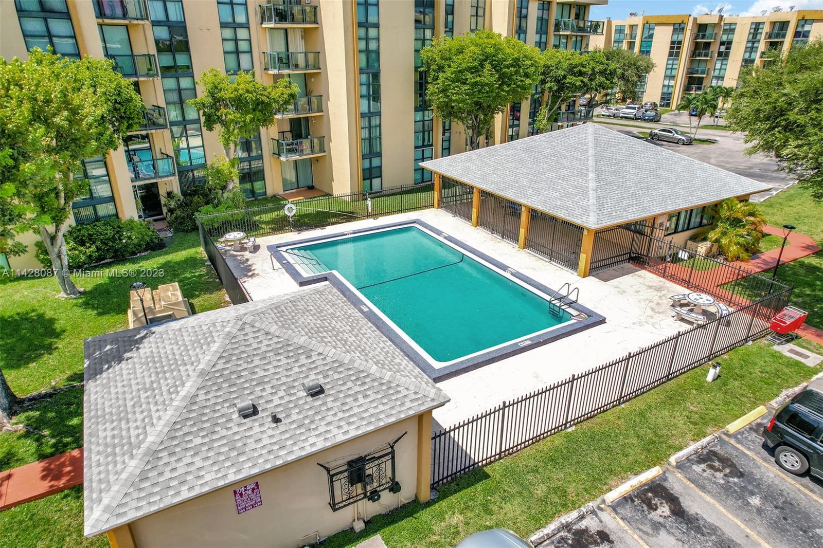 11800 Southwest 18th Street, Unit 5084 Miami, FL 33175 - Photo 32 of 44 a view of a backyard with a patio and plants