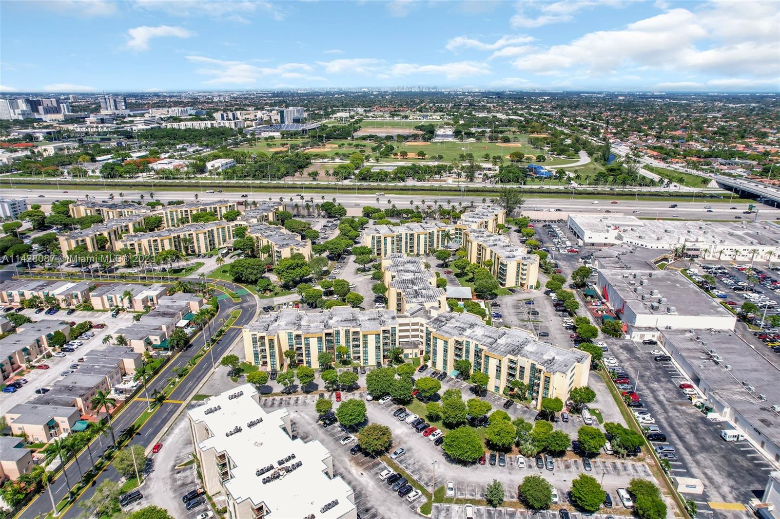 11800 Southwest 18th Street, Unit 5084 Miami, FL 33175 - Photo 41 of 44 an aerial view of residential building with outdoor space