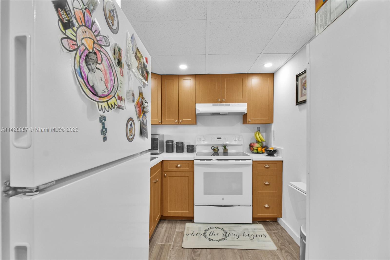 11800 Southwest 18th Street, Unit 5084 Miami, FL 33175 - Photo 7 of 44 a kitchen with stainless steel appliances granite countertop a sink and a stove