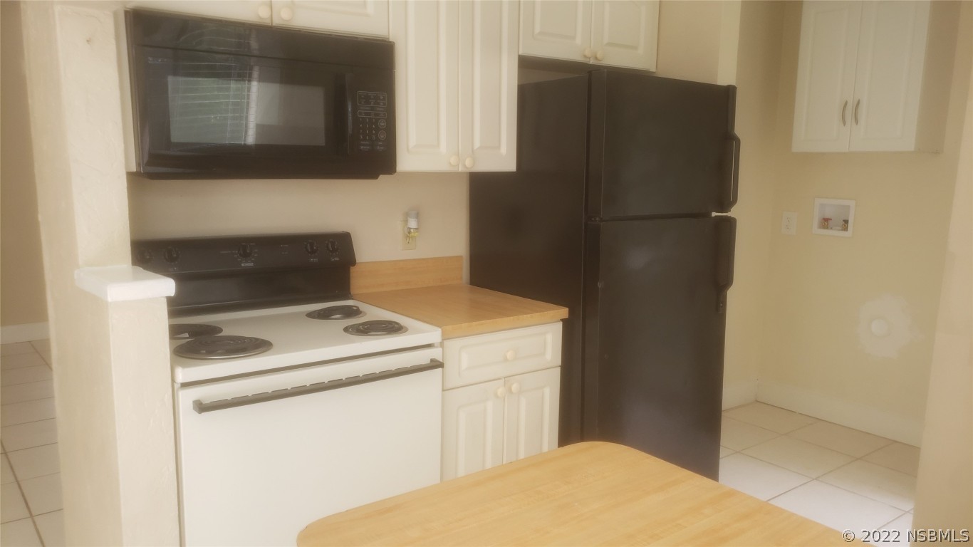 322 Canal Road, Unit 22 Edgewater, FL 32132 - Photo 17 of 17 a utility room with dryer and washer